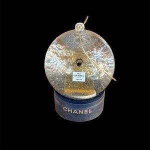 limited edition Chanel snow globe, miniature Chanel No. 5 perfume bottle inside